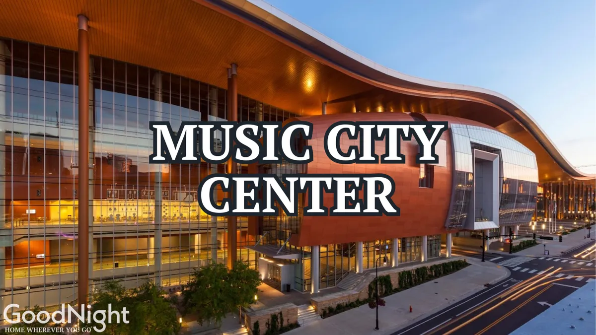 The image features the distinctive facade of the Music City Center, surrounded by trees and bustling city streets. This exterior shot emphasizes one of Nashville’s premier venues for concerts, exhibitions, and community events.